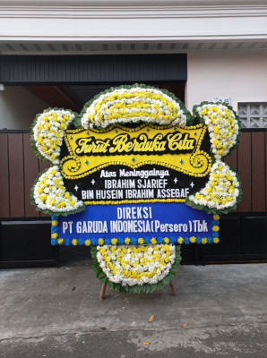 Papan Bunga Duka di Pondok Suguh