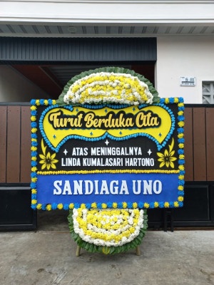 Papan Bunga Duka di Pondok Suguh
